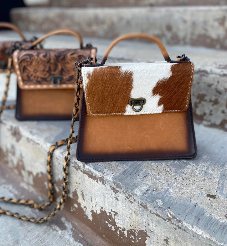 Elegant women's bags with fold-over flap and gold hardware for a polished finish-Burned Leather & Cowhide Crossbody Bag